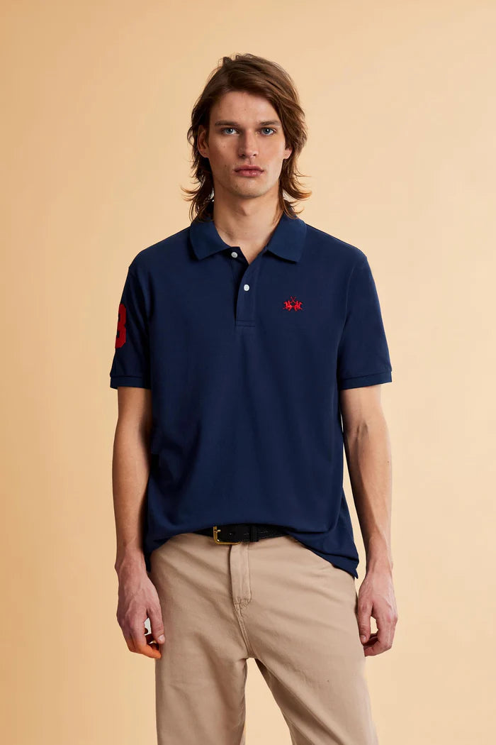 Polo de piqué elástico para hombre de La Martina con número en la manga | Azul marino